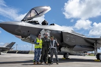 From left: Royal Australian Air Force maintainer, U.S. Air Force Lt. Col. Mike Loringer, 134th Fighter Squadron pilot, and Japan Air Self Defense Force maintainer pose for photo in front of a F-35A Lightning II during exercise Cope North 25 at Andersen Air Force Base, Guam, Feb. 13, 2025.