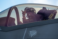 A Japan Air Self Defense Force pilot shares a signal to JASDF leadership before taking-off in an F-35A Lightning II for exercise Cope North 25 at Andersen Air Force Base, Guam, Feb. 13, 2025.