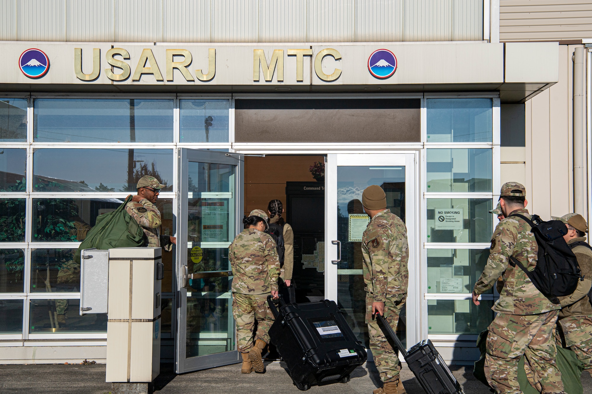 Airmen enter the U.S. Army Japan Mission Training Complex.