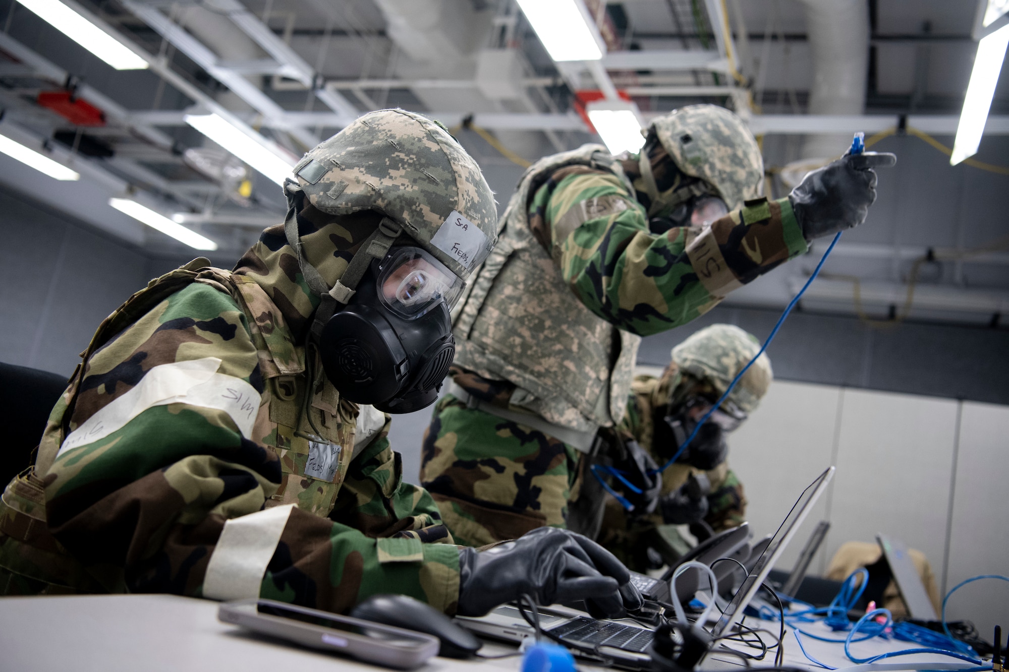 Airmen set up a communications fly-away kit.
