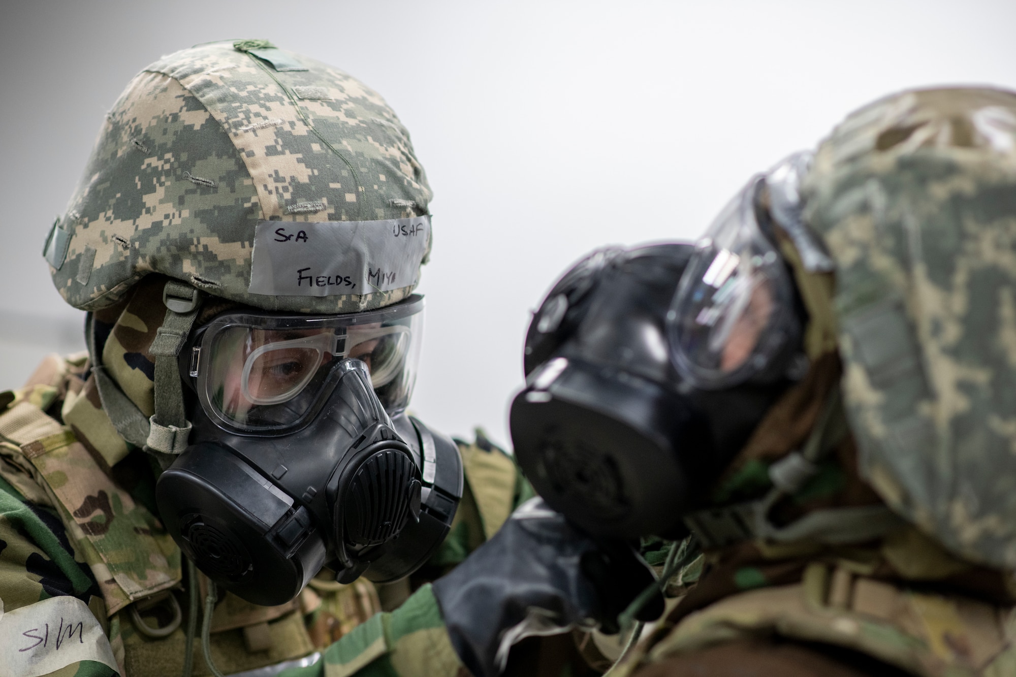Airmen conducts a buddy check.