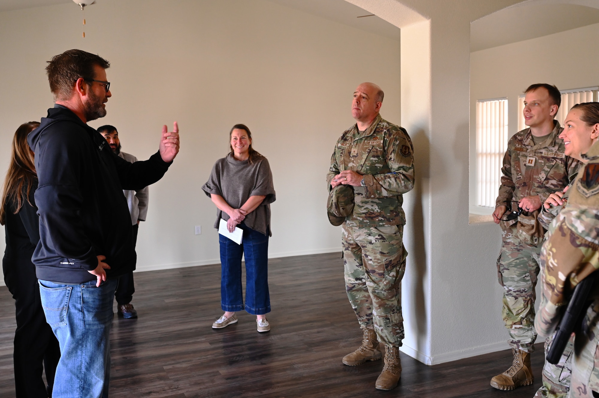 U.S. Air Force Brig. Gen. Patrick Miller, Air Force Civil Engineer Center commander, meets with the housing office team to discuss infrastructure operations and projections at Davis-Monthan Air Force Base, Arizona, Feb. 12, 2025. The tour concluded with an all call and Boss and Buddy, where Airmen could interact with the command team in a casual setting. (U.S. Air Force photo by Senior Airman Andrew Garavito)
