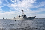 Arleigh-Burke class guided missile destroyer USS Thomas Hudner (DDG 116) gets underway from Naval Station Mayport, Fla., beginning its transit to relieve USS St. Louis (LCS 19) as the ready ship in the U.S. Southern Command area of operations February 18, 2025.