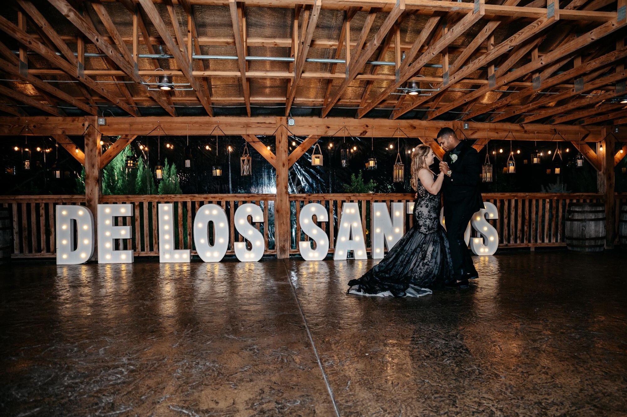 U.S. Air Force Staff Sgt. Hector De Los Santos, 378th Expeditionary Force Support Squadron lodging noncommissioned officer in charge, and U.S. Air Force Senior Airman Hana De Los Santos, 378th Expeditionary Force Support Squadron command support staff, dance at their wedding in Pacific, Montana, Dec, 8, 2023.