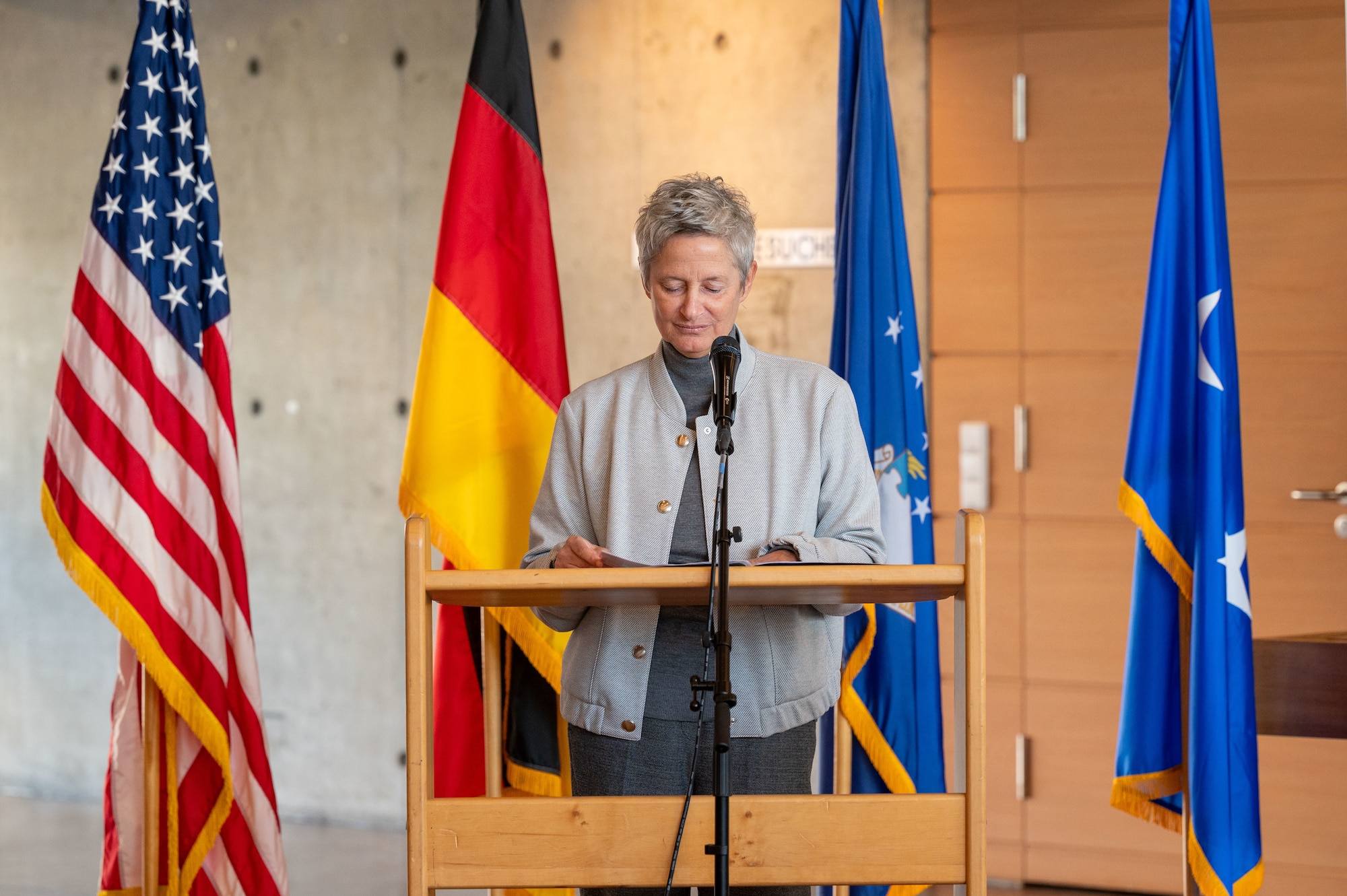 Beate Kimmel, Lord Mayor of Kaiserslautern, Germany, delivers opening remarks at an art exhibition opening for the 22nd German American Community Office anniversary in Kaiserslautern, Germany, Feb. 18, 2025. The GACO serves as a focal point of information between the local community and U.S. service members stationed within the KMC.