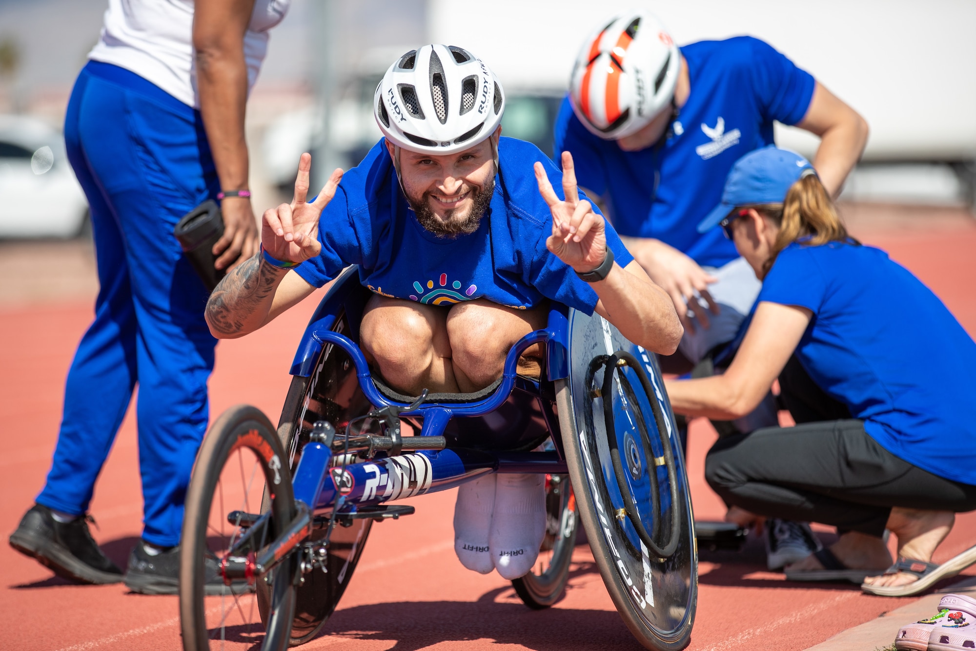 Retired SrA Jomaar Rodriguez-Pagan sits ready and and motivated as he gets ready to practice wheelchair racing in preparation for the Air Force & Marine Corps Trials.