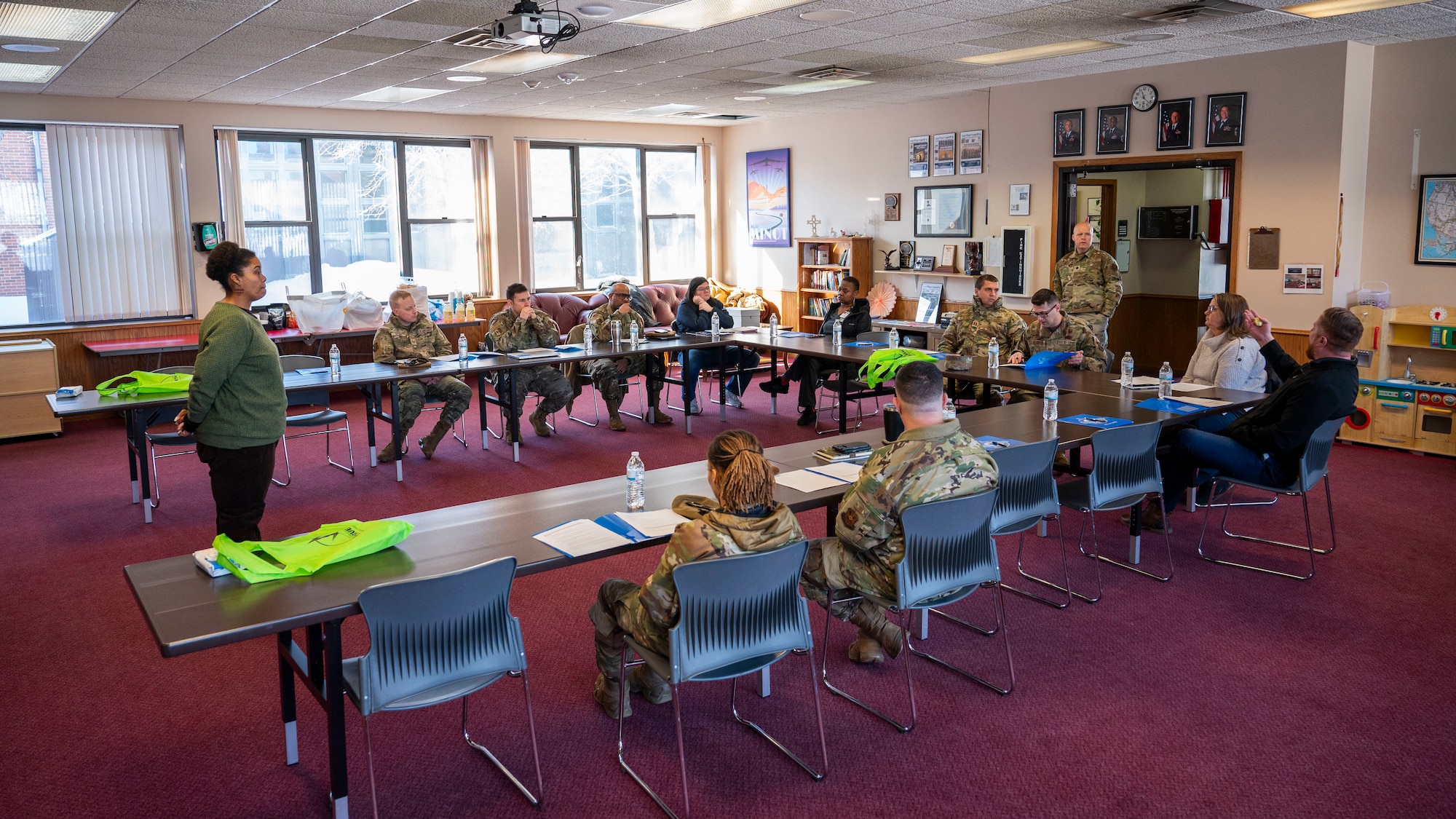 True North members discuss what events, educations and activities are planned for the next quarter during the True North - Minot Installation Cohesion Meeting 2025 at the Northern Lights Chapel on Minot Air Force Base, North Dakota, Feb. 12, 2025. This resilience program considers social events as essential for good mental health and well-being in the workplace. (U.S. Air Force photo by Senior Airman Kendra A. Ransum)