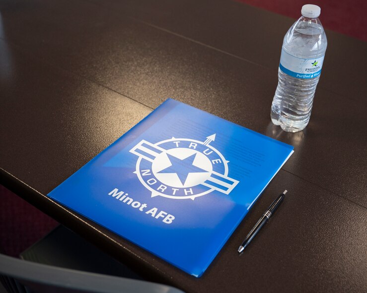 A True North folder sits on a table at the Northern Lights Chapel on Minot Air Force Base, North Dakota, Feb. 12, 2025. True North is a resilience program that provides service members and their families with integrated mental health support and consists of support teams that are directly embedded into Air Force units. (U.S. Air Force photo by Senior Airman Kendra A. Ransum)