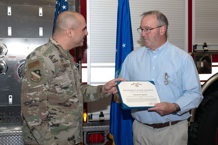 Image of person receiving an award.
