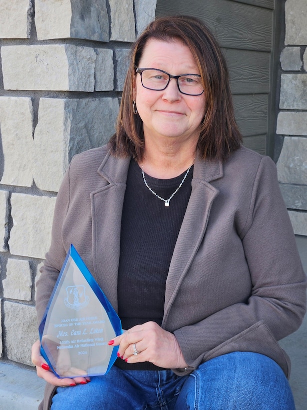 Cara Loken, Reserve Component Transition Assistance Advisor for the Nebraska National Guard and spouse of John Loken, Commander of the 155th Maintenance Group, has been named the 2024 Air Force Association Air National Guard Spouse of the Year. This prestigious award recognizes the significant contributions and support provided by spouses of Air Force personnel across Active Duty, Guard, and Reserve components. Loken's dedication to Nebraska National Guard families and service members for over 25 years exemplifies the vital role family support plays in mission success.