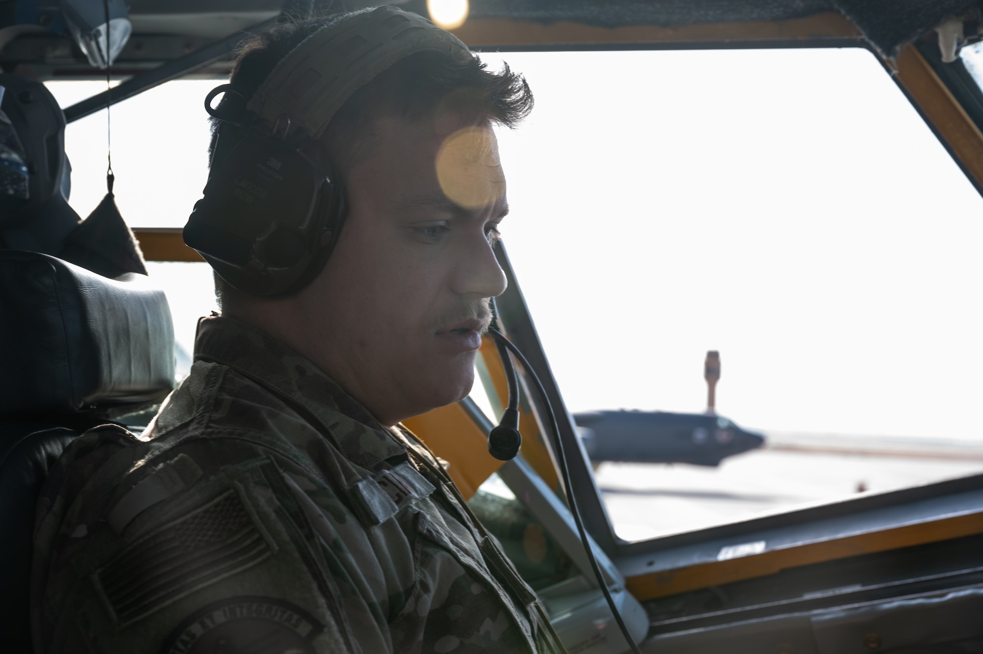 Senior Airman Craig Moccia, 55th Aircarft Maintenance Squadron dedicated crew chief, performs a preflight inspection on a RC-135V/W Rivet Joint before Red Flag 25-1 at Nellis Air Force Base, Nevada Jan. 26, 2025. Red Flag is an opportunity for our warfighters to hone the skills they’ll need for the future fight by operating on their own makes the mission more resilient and survivable. (U.S. Air Force photo by Tech. Sgt. Chris Thornbury)