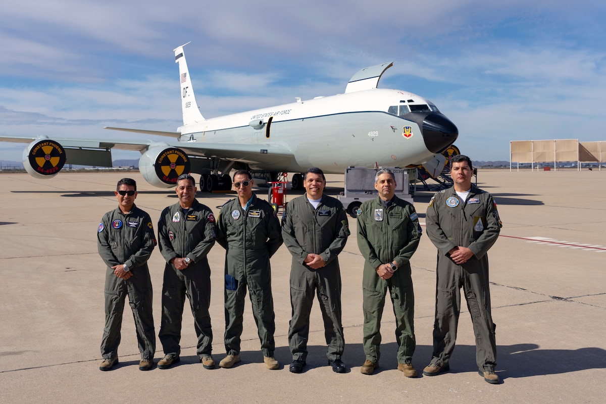 (From left to right) Foreign Liaison Officers from Colombia, Peru, Ecuador, Brazil, Argentina and Chile pose for a group photo in front of a WC-135 Constant Phoenix aircraft, Feb. 13, 2025 at Davis-Monthan Air Force Base, Arizona. FLOs serve as key representatives of their home nations’ air forces within Air Forces Southern, the air component of U.S. Southern Command. They facilitate communication, coordination, and cooperation between the U.S. and partner nations, strengthening military relationships and enhancing regional security efforts. (U.S. Air Force Photo by Tech. Sgt. Rachel Maxwell)