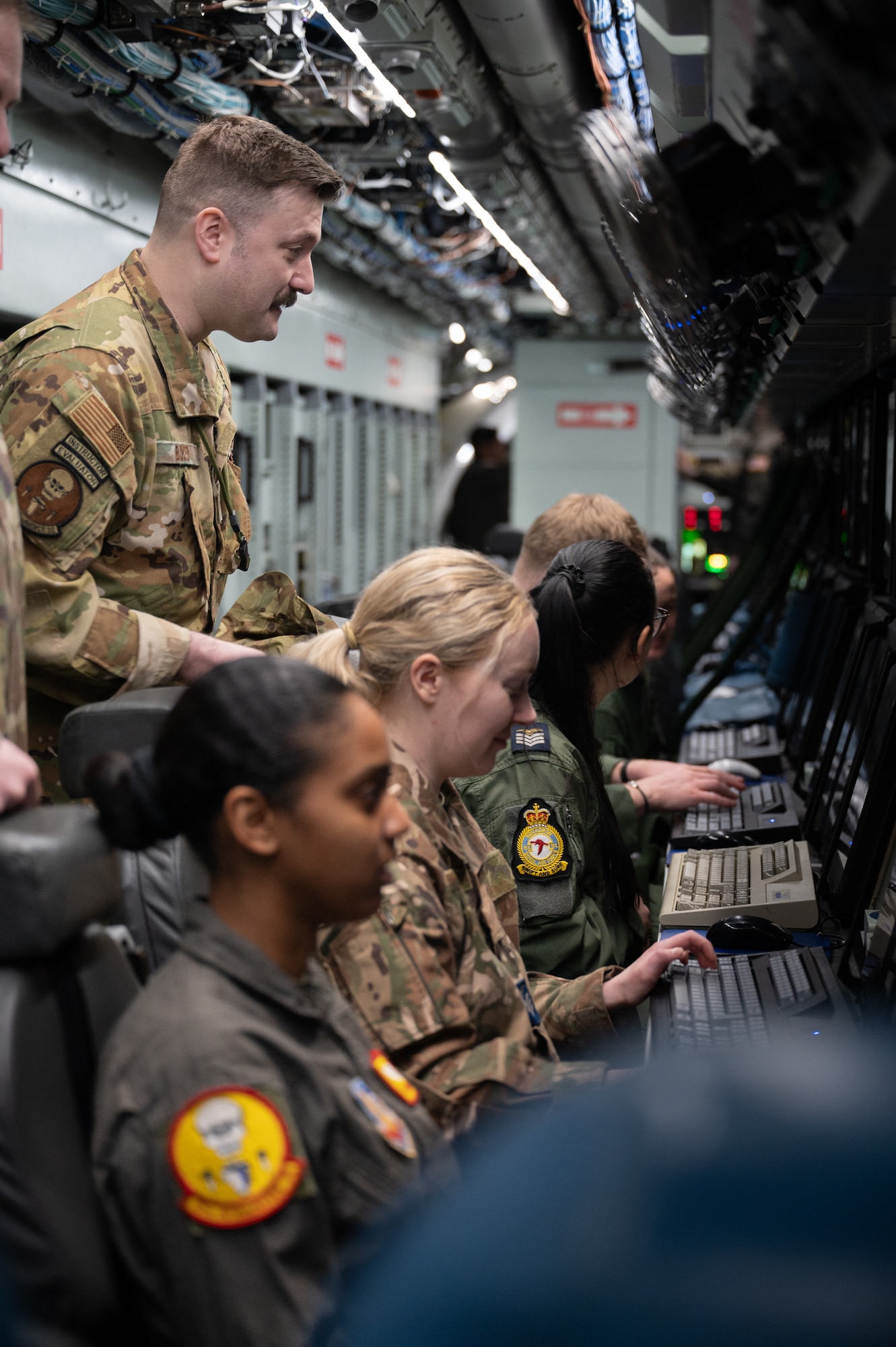 Airmen from the 343rd Reconnaissance Squadron and 97th Intelligence Squadron integrate with the Royal Air Force’s 51st Squadron on a RC-135V/W Rivet Joint before Red Flag 25-1 at Nellis Air Force Base, Nevada Jan. 26, 2025. Red Flag provides participants the opportunity to plan and employ together in a contested, degraded and operationally limited environment to strengthen integration among partners to maximize strategic capabilities. (U.S. Air Force photo by Tech. Sgt. Chris Thornbury)