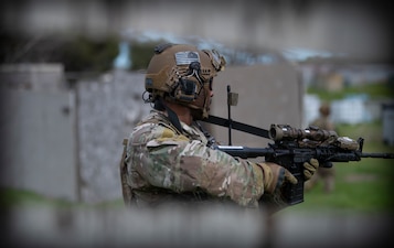 Man aims weapon