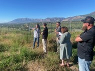 Peifen Tamashiro, remedial project manager, gives a base tour to members of Hill's Restoration Advisory Board.  The board was formed to enhance community participation in the cleanup process and provide a forum for meaningful dialogue between community members, stakeholders, and Hill AFB environmental officials. (Courtesy photo)