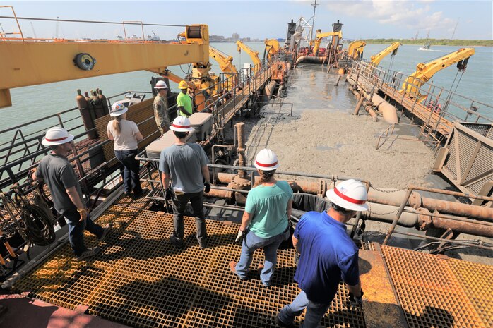 A group from the U.S. Army Corps of Engineers (USACE) Galveston District (SWG) take a tour of the Padre Island, a “suction hopper dredger” working in the Galveston Channel, Aug. 2, 2023. 

Hopper dredges are self-propelled, self-loading ships designed to excavate and load seabed material into a self-contained hopper, through trailing drag arms and pumps for transport to a disposal site. 

SWG contracts dredges like the Padre Island to maintain more than 1,000 miles of channel and 28 ports, which handle an estimated 400 million tons of cargo annually.