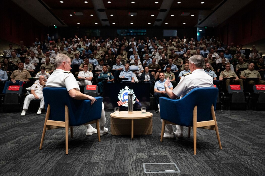 Adm. Samuel J. Paparo, left, commander of U.S. Indo-Pacific Command, and Australian Vice Adm. Justin Jones, Chief of Joint Operations, speak with staff and students from the Australian War College in Canberra, Australia, Feb. 20, 2025. The Australian War College is part of Australian Defence College, the strategic provider of joint professional military education and individual training for the Australian Defence Force. USINDOPACOM is committed to enhancing stability in the Indo-Pacific region by promoting security cooperation, encouraging peaceful development, responding to contingencies, deterring aggression and, when necessary, fighting to win. (U.S. Navy photo by Mass Communication Specialist 1st Class John Bellino)
