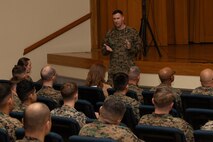 U.S. Marine Corps Col. Paul Bock, commanding officer of Combat Logistics Regiment 37, 3rd Marine Logistics Group (3rd MLG), speaks during a Korean Marine Exchange Program pre-deployment brief at Camp Kinser, Okinawa, Japan, Feb. 6, 2025. Marines and Sailors with 3rd MLG attended a pre-deployment brief designed to equip them with essential information on operational readiness, mental resilience, and support services to help them transition smoothly into their deployment. (U.S. Marine Corps photo by Lance Cpl. Rachel Mason)