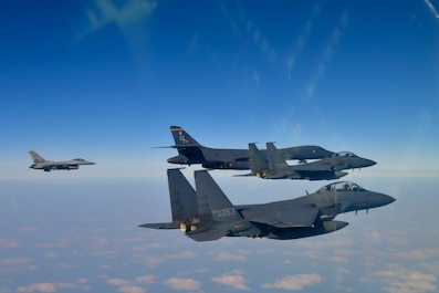 OSAN AIR BASE, GYEONGGIDO [KYONGGI-DO], South Korea (Feb. 20, 2025) — A U.S. Air Force F-16, left, flies in formation with a U.S. Air Force B-1B Lancer, middle, and two Republic of Korea Air Force F-15K Slam Eagles, during a bilateral training event in airspace over South Korea, Feb. 20, 2025. The bomber, assigned to the 34th Expeditionary Bomb Squadron, is currently deployed to Andersen Air Force Base, Guam, in support of Bomber Task Force 25-1. (Photo courtesy of ROK Air Force)