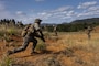 U.S. Marines buddy rush during a live-fire range on Camp Hansen, Okinawa, Japan, Feb. 14, 2025.