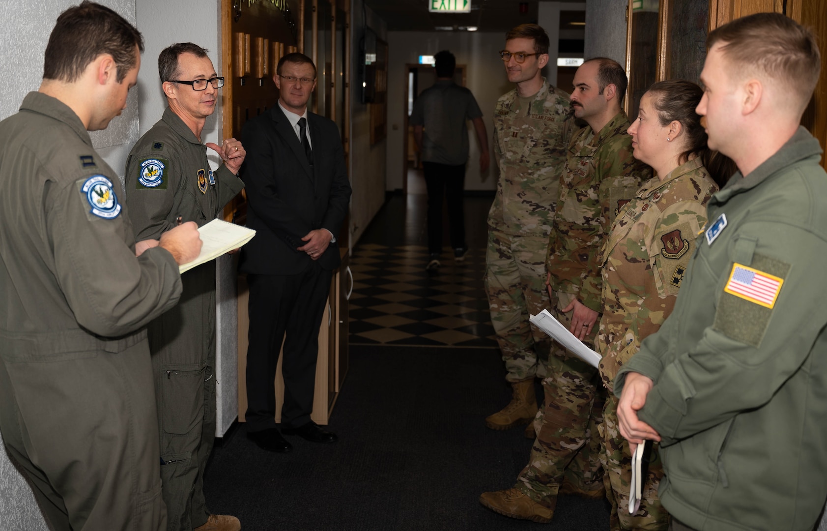 Participants of the Military Aviator Peer Support wingman face-to-face training discuss scenarios they plan to instruct at Ramstein Air Base, Germany, Feb. 19, 2025. All participants of the training were recommended by their peers in the 86th OG to be part of the training because of their reputation of being supportive. Upon completion of the training, volunteers will be known amongst members of the 86th OG as Wingman Peers whom Airmen can talk to about life stressors. (U.S. Air Force photo by Senior Airman Jared Lovett)