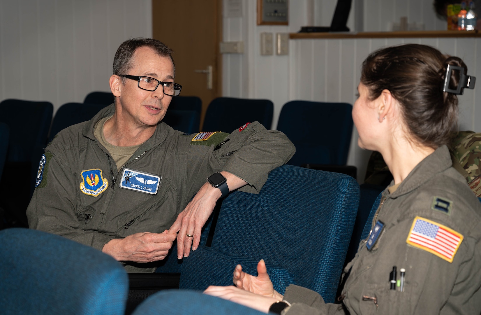 U.S. Air Force Lt. Col. Darrell Zaugg, 37th Airlift Squadron flight surgeon, and Capt. Krista St John, 76th Airlift Squadron pilot, conduct Military Aviator Peer Support wingman face-to-face training at Ramstein Air Base, Germany, Feb. 19, 2025. All participants of the training were recommended by their peers in the 86th OG to be part of the training because of their reputation of being supportive. Upon completion of the training, volunteers will be known amongst members of the 86th OG as Wingman Peers whom Airmen can talk to about life stressors. (U.S. Air Force photo by Senior Airman Jared Lovett)