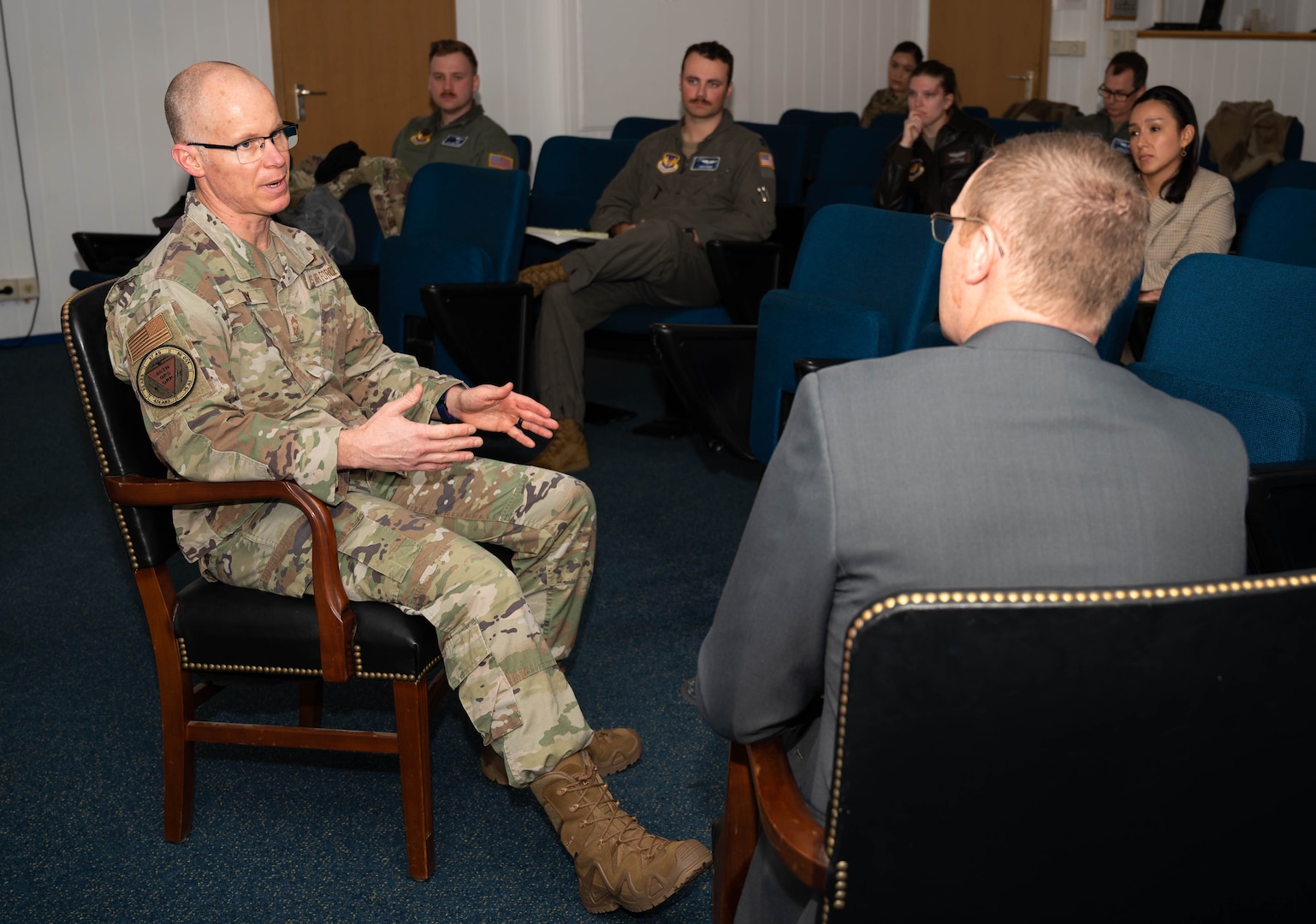 U.S. Air Force Chief Master Sgt. Bryant Roy, 86th Operations Group senior enlisted leader, performs in a mental health crisis scenario during a Military Aviator Peer Support wingman face-to-face training at Ramstein Air Base, Germany, Feb. 19, 2025. All participants of the training were recommended by their peers in the 86th OG to be part of the training because of their reputation of being supportive. The training enhanced their skills in listening to and supporting fellow Airmen needing help with life stressors. (U.S. Air Force photo by Senior Airman Jared Lovett)