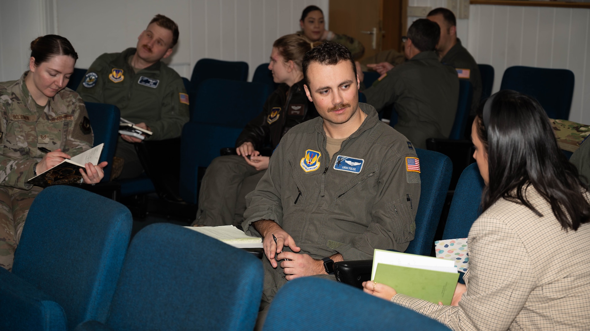 Participants of the Military Aviator Peer Support wingman face-to-face training practice how to interact with a wingman under stress at Ramstein Air Base, Germany, Feb. 19, 2025. Many major airlines have peer support programs which prompted the 86th Operations Group to test their own program. Data collected over the course of a year while this program is in effect will be used to see if it is beneficial to service members and their families. (U.S. Air Force photo by Senior Airman Jared Lovett)