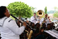 U.S. Naval Forces Europe and Africa Navy Band’s Brass Band, Topside, plays music during the Exercise Cutlass Express 2025 (CE 25) closing ceremony in Dar es Salaam, Tanzania, Feb. 21, 2025.