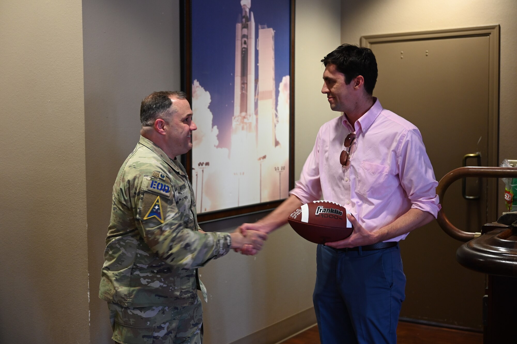 U.S. Space Force Col. Dorian Hatcher, Space Launch Delta 30 deputy commander, and U.S. Air Force Col. Luke Stover, 377th Test and Evaluation Group deputy commander, led a patching ceremony in the Heritage Room at the Pacific Coast Center to celebrate the successful GT-252 test launch at Vandenberg Space Force Base