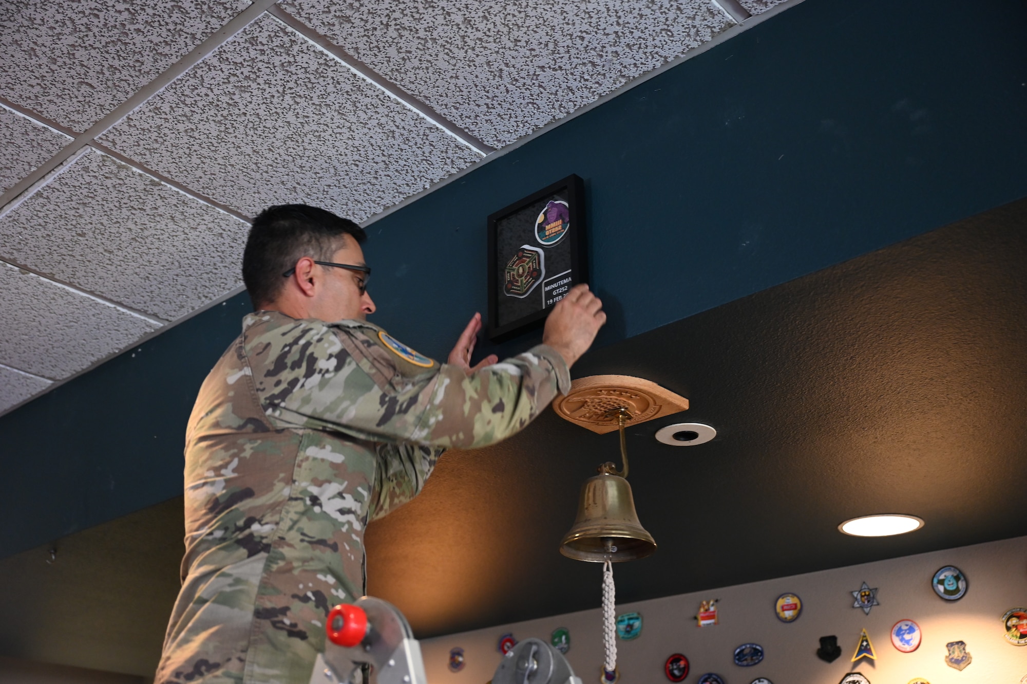 U.S. Space Force Col. Dorian Hatcher, Space Launch Delta 30 deputy commander, and U.S. Air Force Col. Luke Stover, 377th Test and Evaluation Group deputy commander, led a patching ceremony in the Heritage Room at the Pacific Coast Center to celebrate the successful GT-252 test launch at Vandenberg Space Force Base