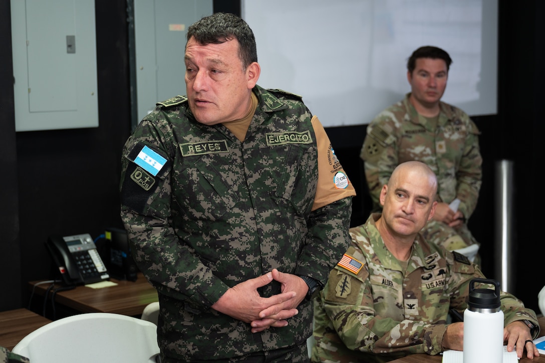 Honduras army Brigadier General José Reyes, Commander of the Ecosystem and Environment Management Support Command, speaks with participants during a tabletop exercise at Soto Cano Air Base, Honduras, February 19, 2025.