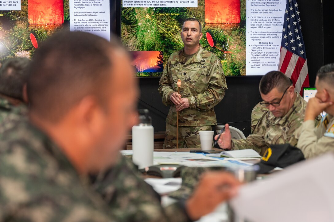 U.S. Army Lt. Col Wayne Hancock, Joint Task Force-Bravo current operations (J3) director, briefs participants during a tabletop exercise at Soto Cano Air Base, Honduras, February 19, 2025.