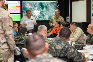 Herberth Gaekel, Joint Task Force-Bravo fire inspector, briefs participants during a tabletop exercise at Soto Cano Air Base, Honduras, February 19, 2025.