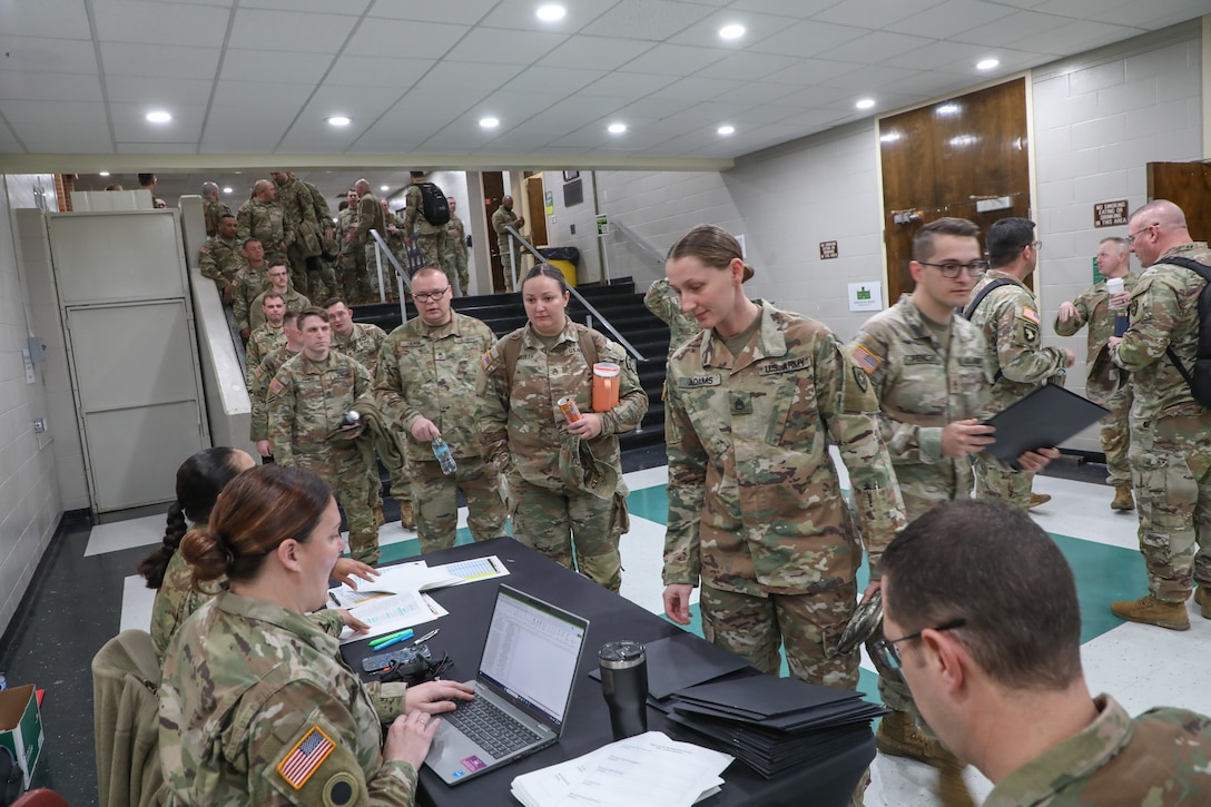 Kentucky Army National Guard staff sergeants and promotable sergeant's check-in prior to the leadership development program event held at Kentucky State University in Frankfort Feb. 8-9, 2025.