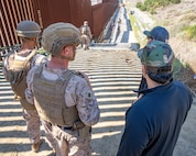 NCIS agents work alongside U.S. Marines at the U.S.-Mexico border in San Ysidro, Calif., Feb. 19, 2025.