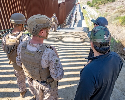 NCIS agents work alongside U.S. Marines at the U.S.-Mexico border in San Ysidro, Calif., Feb. 19, 2025.