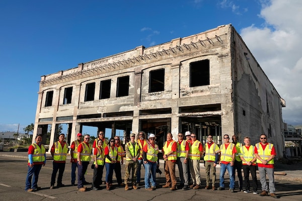 The Recovery Field Office staff near the Lahaina Store on Front Street marking the completion of debris removal from commercial properties
