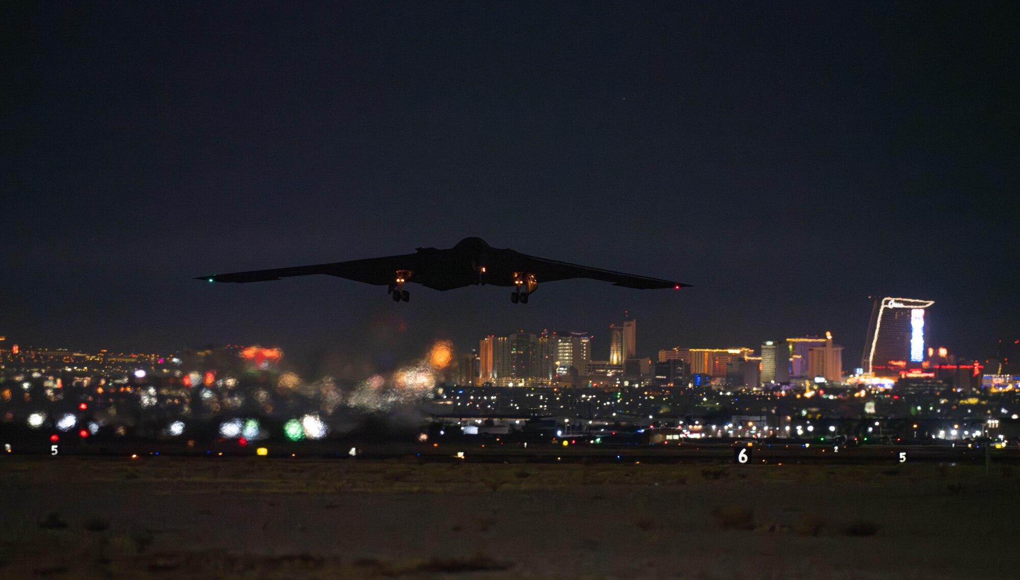 A B-2 Spirit stealth bomber takes off from Nellis Air Force Base, Nevada, during Red Flag 25-1, January 30, 2025. The long-range bomber enhances global strike capabilities and is a key asset in the U.S. Air Force’s strategic deterrence mission. (U.S. Air Force photo by Senior Airman Bryson Sherard)