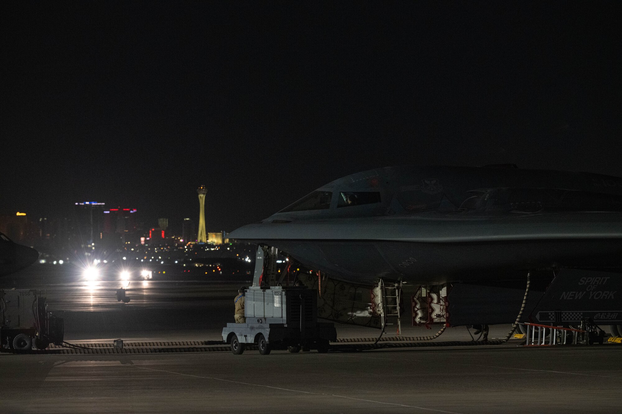 Three B-2 Spirit stealth bombers sit on the flightline after arriving for Red Flag 25-1 at Nellis Air Force Base, Nevada on Jan. 28, 2025. Red Flag provides Airmen with an opportunity to train in realistic scenarios to ensure they are ready anytime, anywhere. (U.S. Air Force photo by Senior Airman Bryson Sherard)