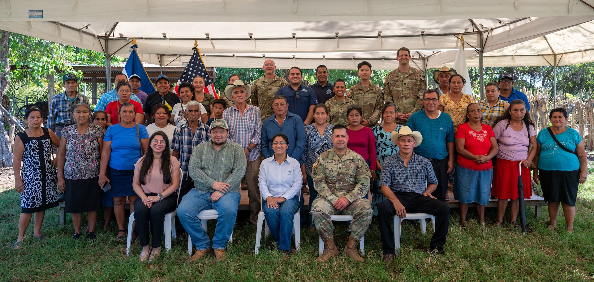 U.S. military members and El Salvadoran agricultural officials attend a ceremony Feb. 19, 2025, to highlight a joint initiative to combat vector-borne illnesses in livestock.  The initiative aims to curb the spread of vector-borne illnesses that threaten animal and human populations. (U.S. Air Force photo)