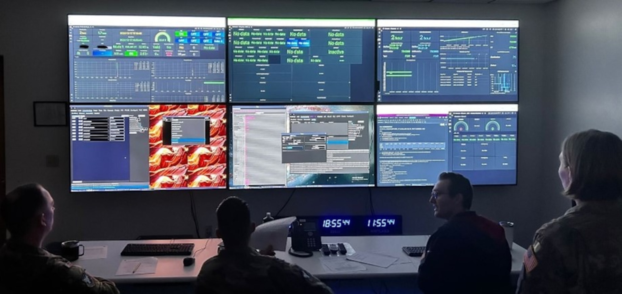 Space Test Course Students preparing for an XVI satellite pass in Test Pilot School's new Satellite Operations Control Room.