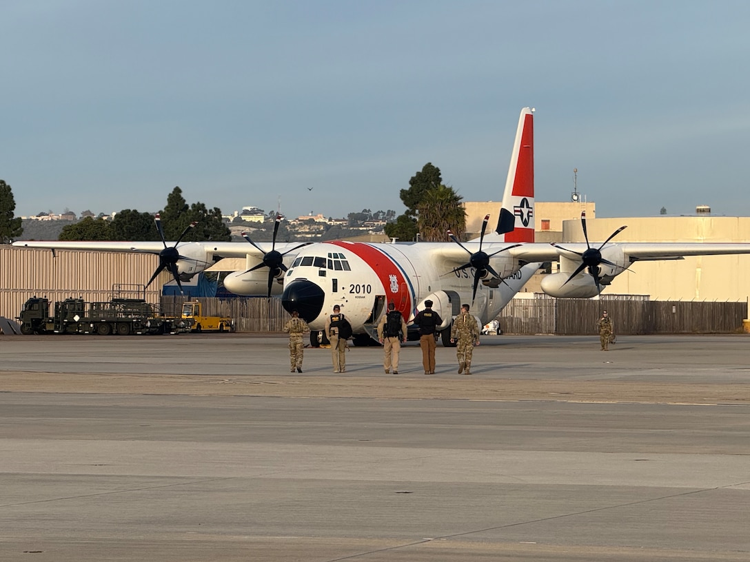 A U.S. Coast Guard C-130 Hercules crew prepares for an alien expulsion flight Feb. 17, 2025.