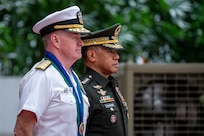 Adm. Samuel J. Paparo, commander of U.S. Indo-Pacific Command, and Gen. Romeo S. Brawner Jr., Chief of Staff of the Armed Forces of the Philippines, participate in an honors ceremony at Camp Aguinaldo during a visit to Manila, Philippines, Feb. 21, 2025. The trip underscored U.S. commitment to the U.S.-Philippines Mutual Defense Treaty in addressing current and emerging threats in the region, while honoring the deep people-to-people ties between the two countries as they mark the 80th anniversary of the Liberation of Manila on Feb. 22. USINDOPACOM is committed to enhancing stability in the Indo-Pacific region by promoting security cooperation, encouraging peaceful development, responding to contingencies, deterring aggression and, when necessary, prevailing in conflict. (U.S. Navy photo by Chief Mass Communication Specialist Shannon M. Smith)