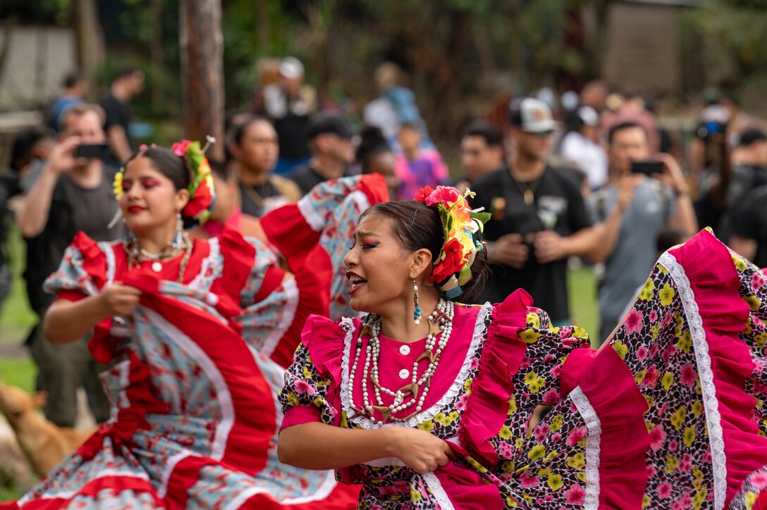 A group of dancers from Ballet Folklorico Municipal Indefolklore de Comayagua  put on a cultural performance for those attending JTF-Bravo’s 100th Chapel Hike February 22, 2023 in El Llano de la Puerta, Honduras. The program's impact extends far beyond the goods delivered, fostering cultural exchange and building lasting bonds between JTF-Bravo and the communities they serve. (U.S. Air Force photo by Staff Sgt. Tristan Biese)