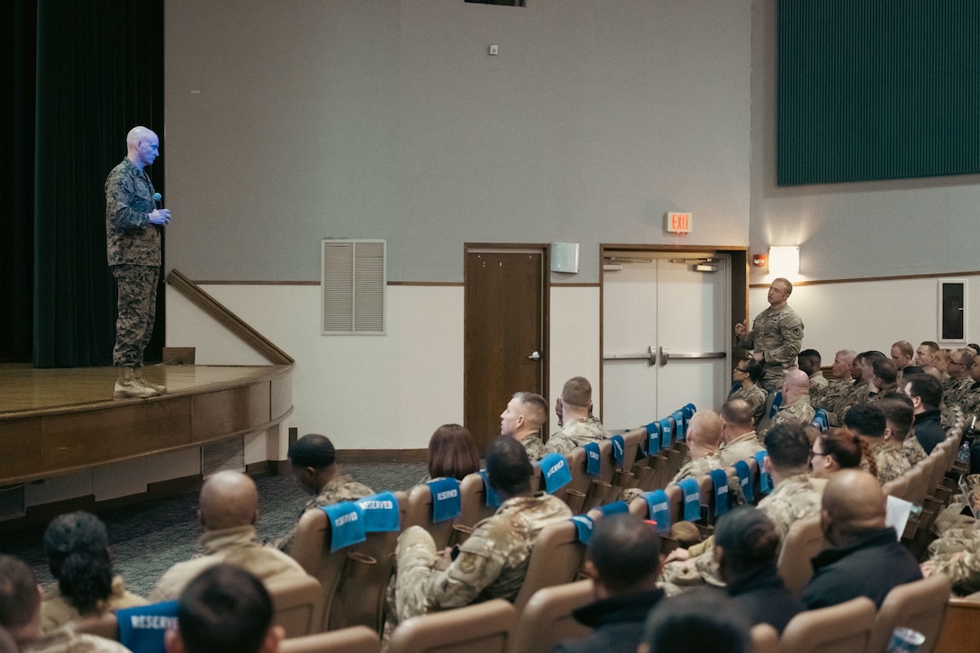 Senior Enlisted Advisor to the Chairman of the Joint Chiefs of Staff, U.S. Marine Corps Sgt. Maj. Troy E. Black, answers a question during an all-call at Joint Base Andrews, Md., Feb. 19, 2025. Attendees asked questions about topics that covered new policies and leadership development. (U.S. Air Force photo by Airman 1st Class Daniel Walderbach)