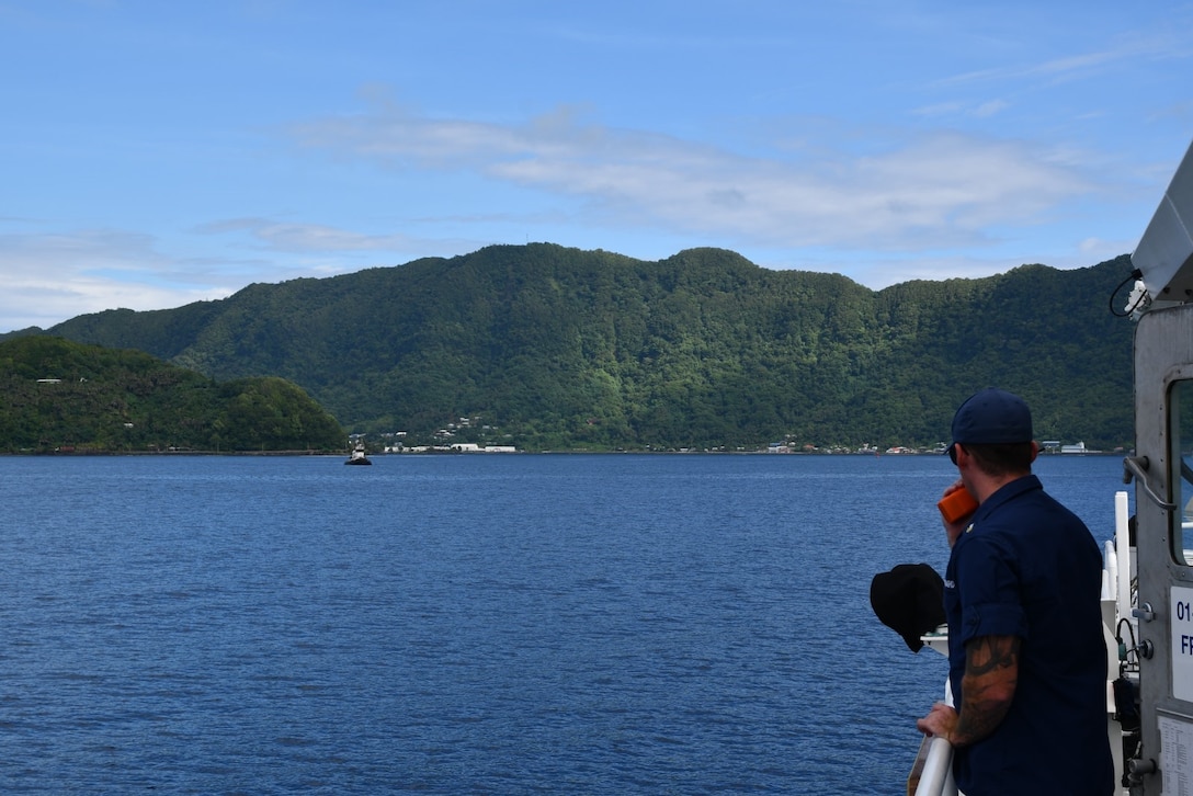 U.S. Coast Guard Petty Officer 1st Class Kyle Cassidy, a boatswain’s mate assigned to Coast Guard Cutter Joseph Gerczak (WPC 1126), monitors the cutter’s approach of Pago Pago, American Samoa, Feb. 5, 2025.  The Joseph Gerczak crew recently conducted a 37-day territorial integrity patrol along the U.S. maritime border in American Samoa. (U.S. Coast Guard photo by Petty Officer 1st Class Steven Zea)