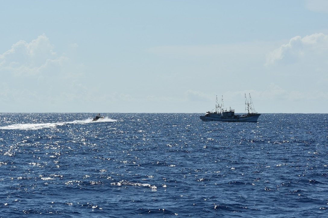 A small boat crew assigned to U.S. Coast Guard Cutter Joseph Gerczak (WPC 1126) prepares to board a U.S.-flagged commercial fishing vessel off the coast of American Samoa Feb. 7, 2025. Due to American Samoa’s status as a U.S. territory, the Coast Guard has the authority to conduct boardings in the U.S. Exclusive Economic Zone surrounding the territory, which extends up to 200 nautical miles offshore. (U.S. Coast Guard photo by Ensign Samuel Carrol)