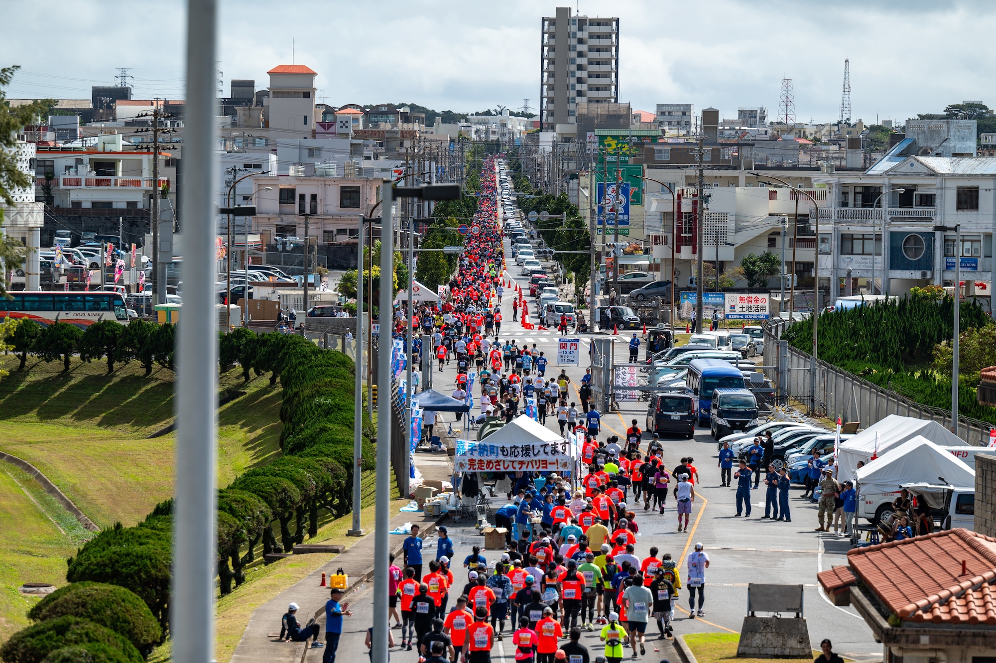 Runners exiting gate 5 during the Okinawa Marathon