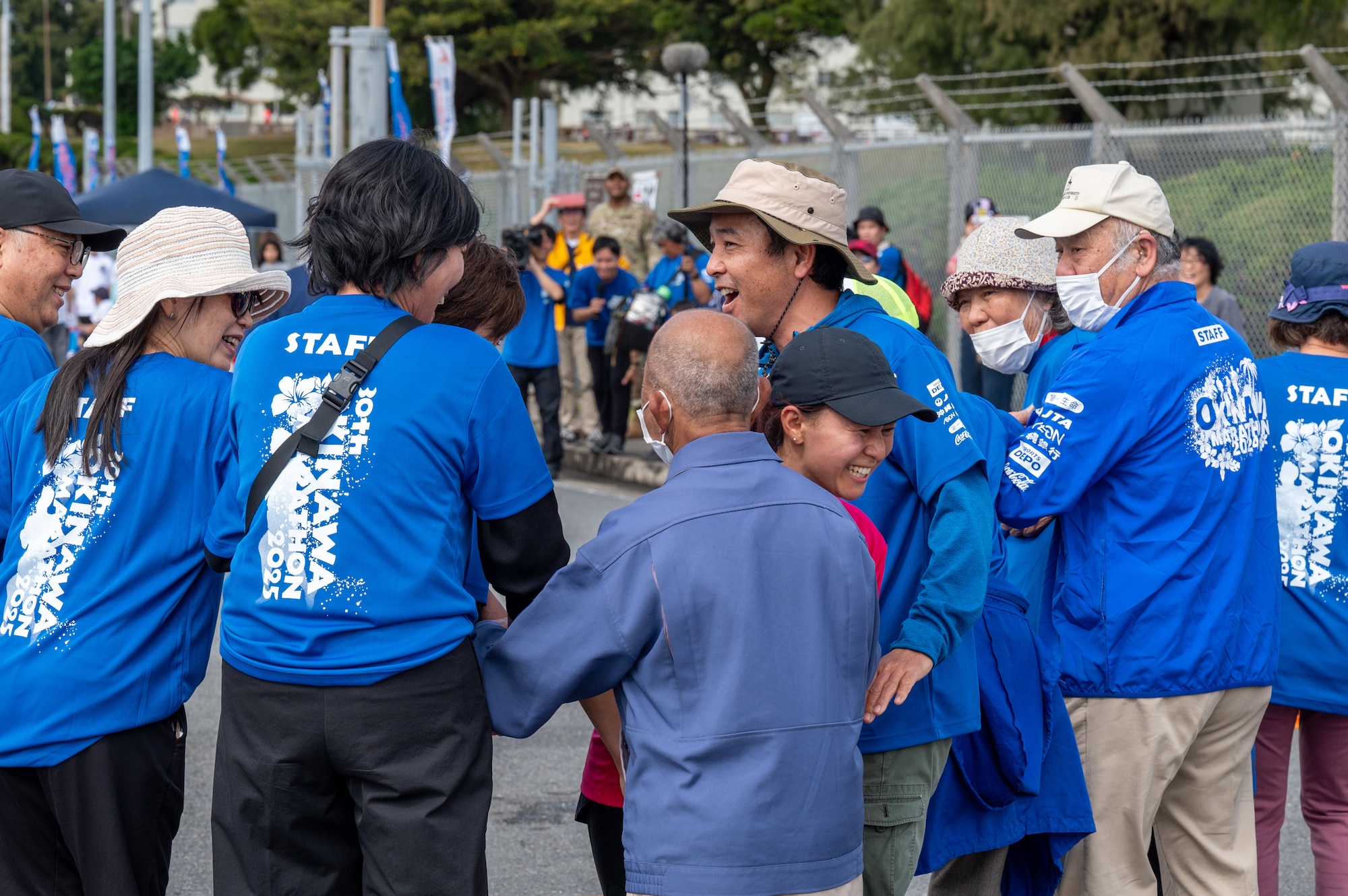 A Runner slipping by volunteers before they fully blocked gate 5
